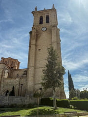 Obraz premium Santa Maria la Mayor church in Villamuriel de Cerrato with Romanesque apse and bell tower