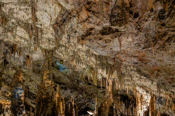 Postojna cave ceiling with stalactites
