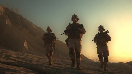 Three Soldiers in Uniform Walk Through a Desert Landscape at Sunset, Carrying Rifles. Professional Army ready to Fight Enemy. Portrait of Heroes Marching on a Dangerous Mission