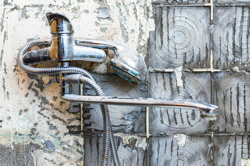 Old residential old bathroom faucet, shower, wall preparation for tiling, Euro repair. Interior...