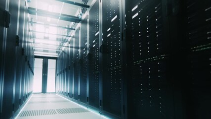 Moving Shot Through a Modern Data Center Server Room With Rows of Server Racks, Led Lights. No People.High-tech, and Designed for Enterprise AI Nig Data Machine Learning Infrastructure. - Powered by Adobe