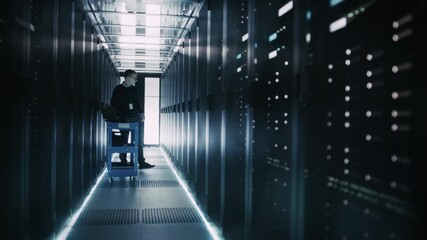 IT Technician Uses a Laptop on a Rolling Cart While Inspecting Server Racks in Data Center,  Network Hardware and Equipment, System Reliability Cyber Security of Artificial Intelligence Work - Powered by Adobe