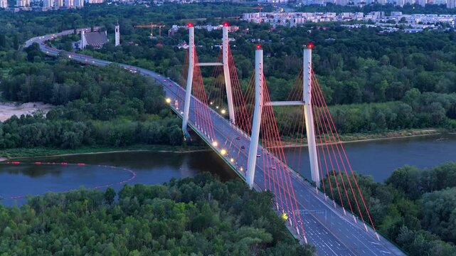 Aerial view of Siekierkowski bridge over Vistula in Warsaw, evening traffic