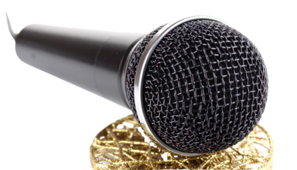 Colorful disco microphone for karaoke and music performance isolated on solid white background in Png format