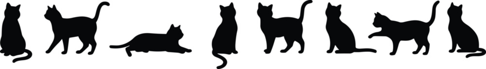 Collection of black silhouettes of cats in various poses on a white background sitting