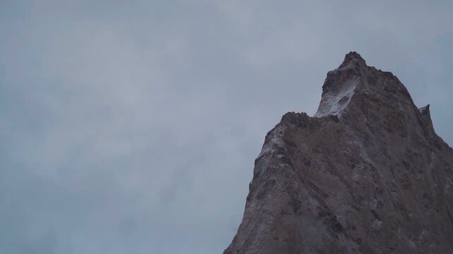 Closeup shot of Gonbo Rangjon mountain peak with little snow on top of it during a winter storm in Autumn season at Zanskar Valley in remote Ladakh, India. Scenic view of God`s mountain in Zanskar.
