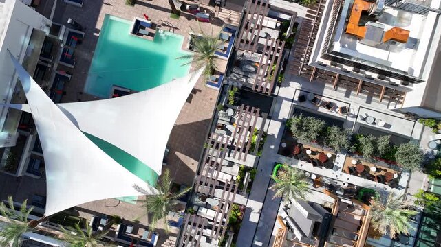 Aerial view of the geometric layout of the pool, buildings, and outdoor seating areas, forming a harmonious blend of urban design, Scottsdale, Arizona, United States.