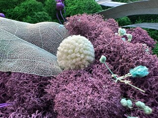 Beautiful Floral Arrangement with Purple Moss and Decorative Elements for Home Decor
