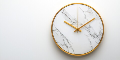 A modern wall clock with a white marble pattern and a gold frame is mounted on a white wall. The clock face is circular with delicate golden hands pointing to the current time. 