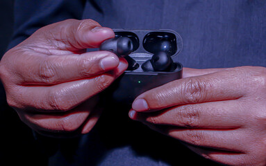 A Detailed Close-up of a Hand Wearing a Pristine White Rubber Glove Delicately Holding a Clear, Ornate Glass Cup, an Image That Powerfully Conveys the Concepts of Purity