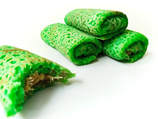 A Delicious Indonesian Rolled Pancake on a Wooden Surface