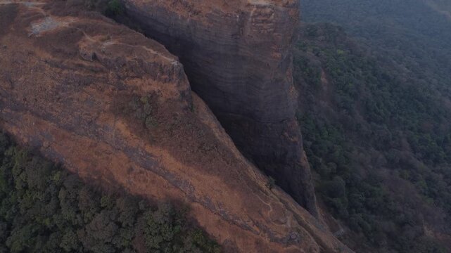 Revealing drone shot of Sahyadri mountain range in Lonavala, montane forests and ecosystem, Maharashtra
