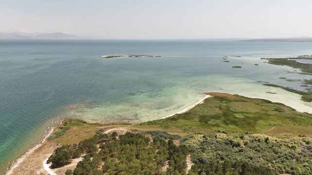 Aerial Drone of Lake Sevan is the largest body of water in both Armenia and the Caucasus region. It is one of the largest freshwater high-altitude (alpine) lakes in Eurasia