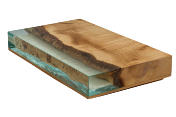 Unique cutting board featuring blend of natural wood grain and glass, showcasing beautiful contrast between two materials. This piece adds elegance to any kitchen while serving practical purposes