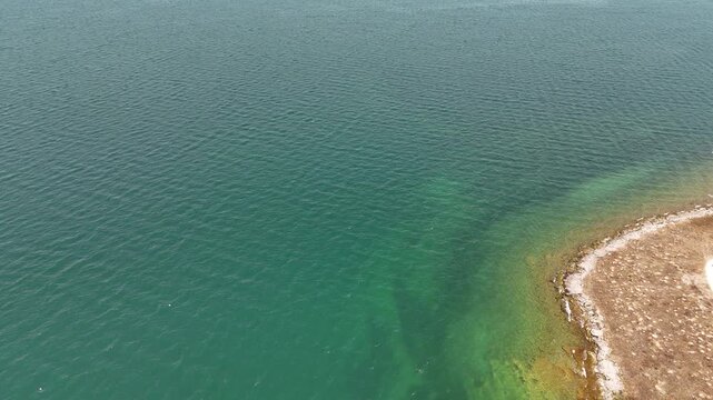 Aerial Drone of Lake Sevan is the largest body of water in both Armenia and the Caucasus region. It is one of the largest freshwater high-altitude (alpine) lakes in Eurasia