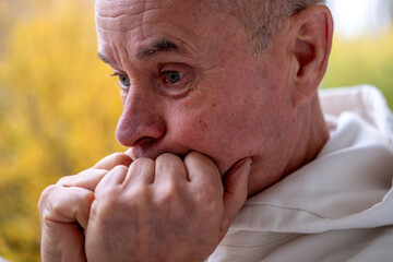 stressed nervous man, tense expression woman reflects worry and distress, deep anxiety in natural...