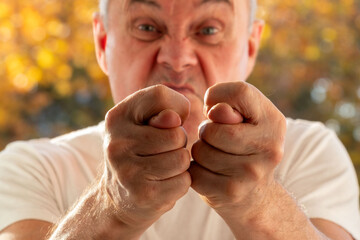 gesture fig, Angry Aggressive Stressed senior man, visual person experiencing intense frustration,...