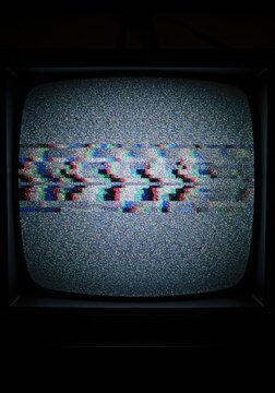 Distorted text on a vintage TV screen