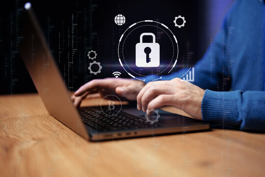 Professional man presenting a digital pad with security symbols in a high-tech environment