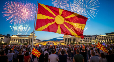 Macedonian flag waves proudly as fireworks illuminate festive crowd celebrating a special event