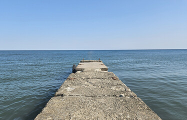 Empty pier with sea and sky as background. Cloudy sky serene ocean. Brighton United Kingdom