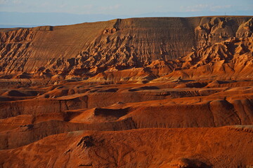 The Red Mountains of Boguta. Mountainous clay terrain. Summer evening time. National Nature Park.