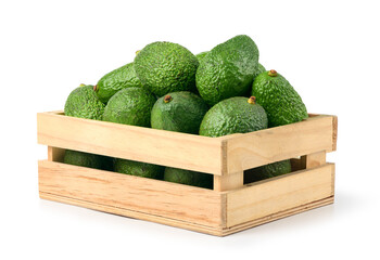 Fresh avocado in wooden crate isolated on white.