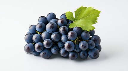 Fototapeta premium A fresh bunch of dark purple grapes with a green leaf on a white background.