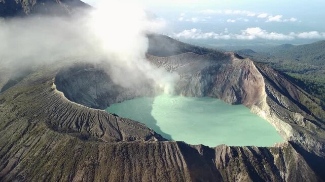 Curved Drone Flight Over Kawah Ijen Volcano Crater Lake