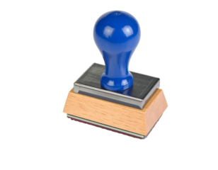 Rubber stamp isolated on white background, classic stationery tool for office, paperwork, documents, authentication, signatures, official use, wooden handle, ink pad accessory, clean minimal presentat