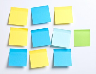 Sticky notes, isolated on a clean white background, are colorful, square, adhesive, and versatile office supplies used for reminders, organization, note-taking, planning, brainstorming, labeling, high