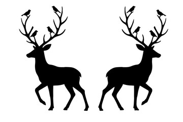 reindeer's with log horns, birds are sitting on it silhouette
