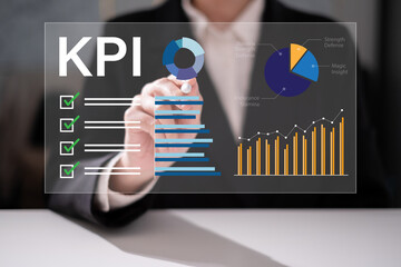 Professional entrepreneur business man focus on KPI Key Performance Indicator data analysis project progress tracking for business success goal achievement and management graph chart dashboard concept