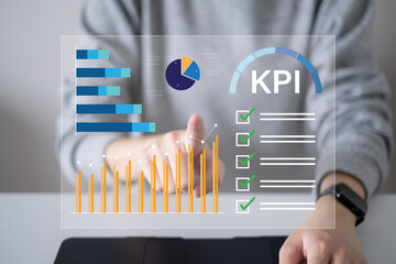 Businessman working on KPI dashboard financial goal target management marketing strategy and...