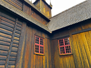 A preserved wooden parish church, a stave church, in the countryside of Norway, August, 2025