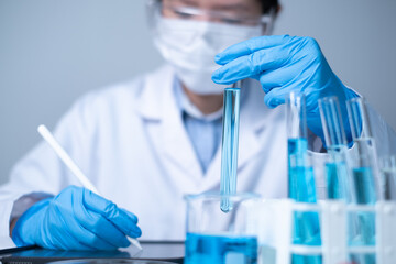 Professional Asian woman scientist chemist technician experiment research in chemistry laboratory...