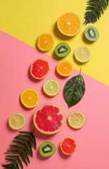 Vivid tropical fruit arrangement showcasing colorful citrus and kiwi on vibrant backgrounds