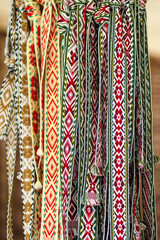 Details of a traditional Lithuanian weave. Woven belts as a part of national Lithuanian costume sold on traditional Easter fair in Vilnius, Lithuania