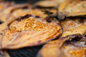 Selection of assorted home made smoked fish on a farmers market in Vilnius, Lithuania.
