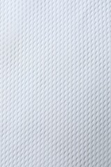 Top vertical view of white texture, structural fabric surface