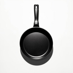 Empty frying pan isolated on a white background top view