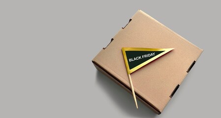 Black Friday sticker on paper flag. Golden color. Cardboard box. Shopping sales banner,...