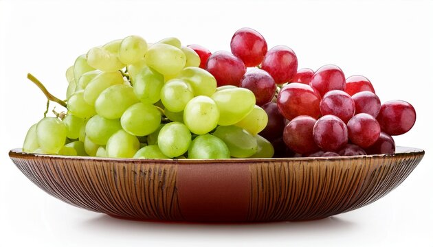 red and green grapes in a bowl isolated