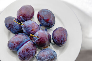 plums on a plate