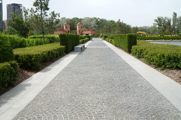 A path paved with gray stone in the park