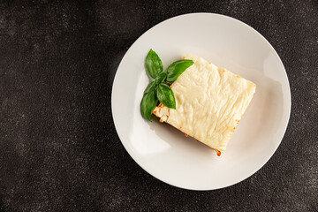 Lasagna bolognese béchamel sauce, meat, cheese second course tasty snack fresh delicious gourmet food background on the table rustic food top view copy space