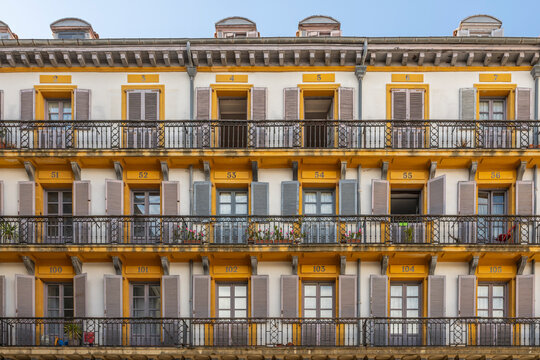 Colorful balconies on historic Plaza de la Constitucion in San Sebastian