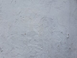 Textured gray wall with plaster material suitable for background design projects, architectural presentations, or interior design concepts.