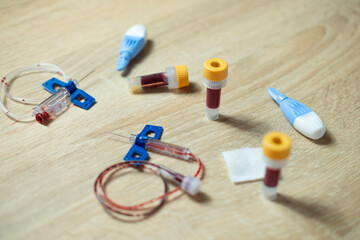 Medical blood collection supplies on table, healthcare and diagnostics, At-home blood typing test,...