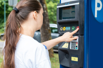 female hand pays for time parking car in street parking meter with solar panels, parking lot, rhythm city life, Technology in Urban Environment in everyday life